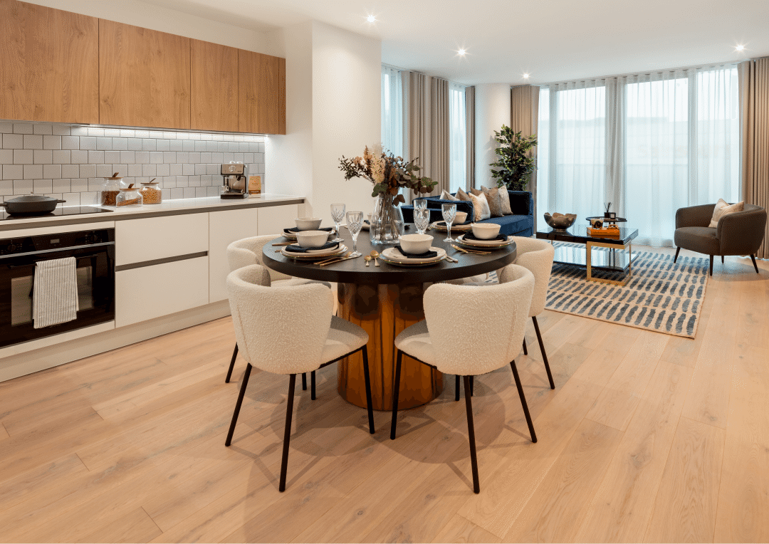 Engineered wood flooring in a modern apartment kitchen and dining area