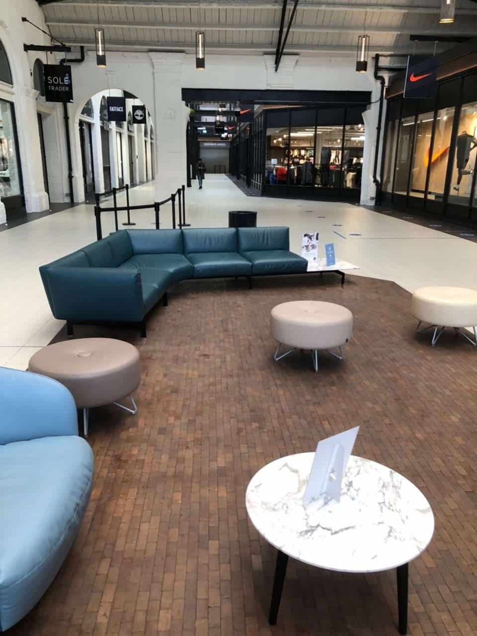 Smoked oak end grain flooring in a shopping centre seating area